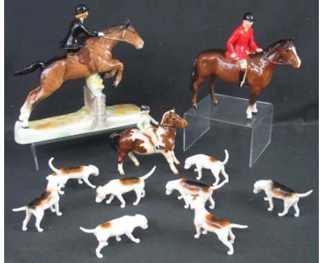 BESWICK CHINA HUNTING GROUP to include: huntsman, model number: 1501; girl on pony, model number: 1499; huntswoman riding sid