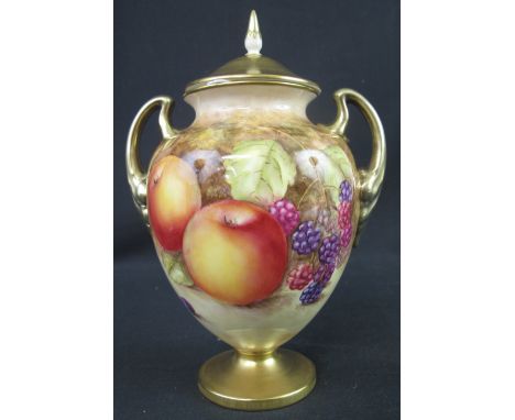 ROYAL WORCESTER BONE CHINA TWO HANDLED VASE AND COVER, overall painted with fruit and foliage on a mossy background within gi