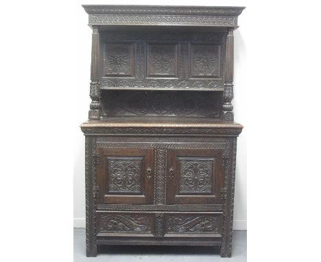 17TH CENTURY STYLE CARVED OAK SIDEBOARD OR DRESSER, a reconstruction, comprising raised blind back with moulded cornice over 