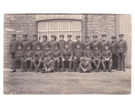 Army Service Corps WWI - A very fine RP card of 25 smartly attired Officers and Soldiers. Photo Jewsons, Kings Lynn