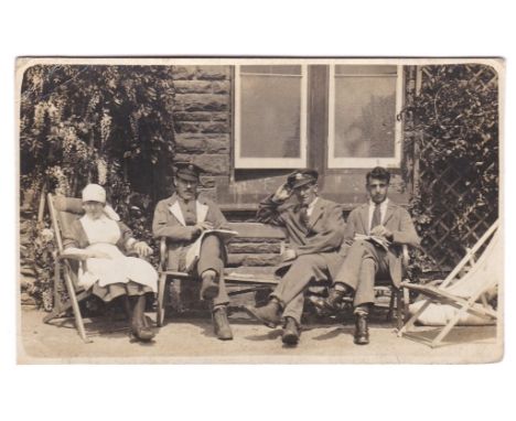 Royal Army medical Corps WWI-Hospital Blues group of three doctors and nurse - RP postcard