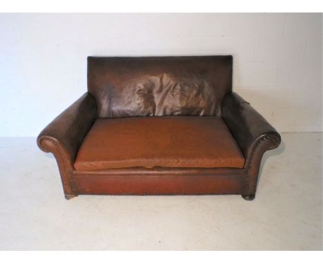 A vintage Rexine sofa, A/F, approximate length 150cm.