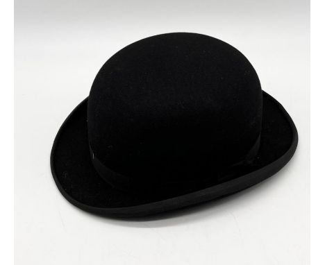 A Dunn &amp; Co. vintage bowler hat with orange lining - size 7 3/8