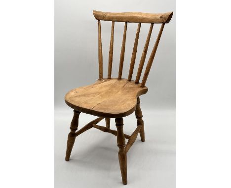 A child's elm stick back chair - height 63cm