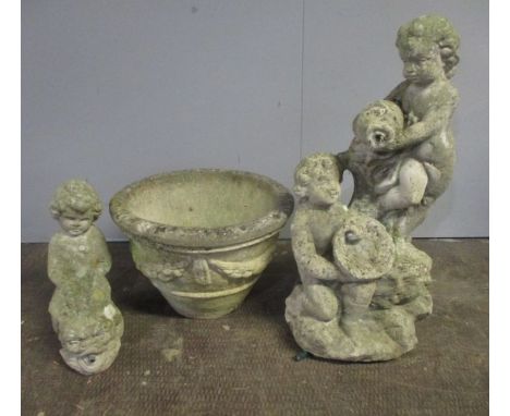 A large reconstituted stone planter plus two water feature, one in the form of classical cherubs, the other in the form of a 