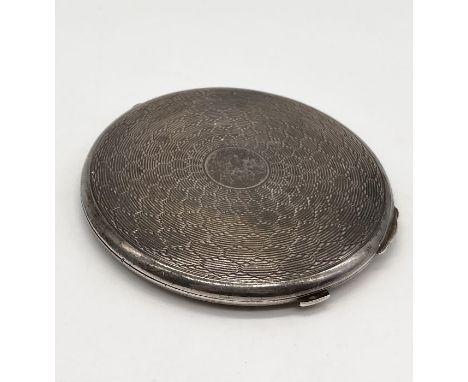 A hallmarked silver compact 