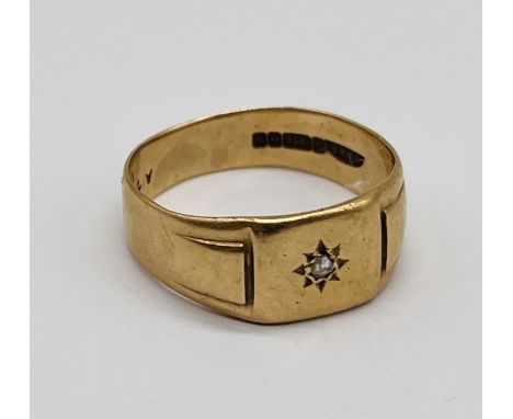 A 9ct gold gentleman's ring set with a small diamond, weight 5g