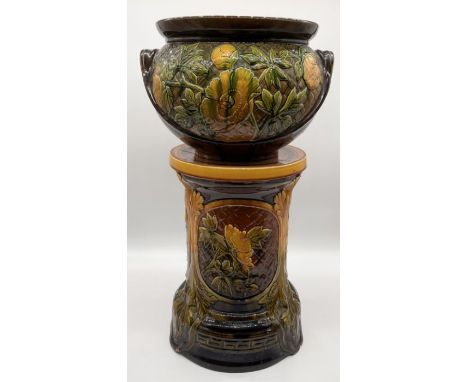 A Bretby majolica jardinière and stand with floral pattern numbered 509 K to base - height 68cm