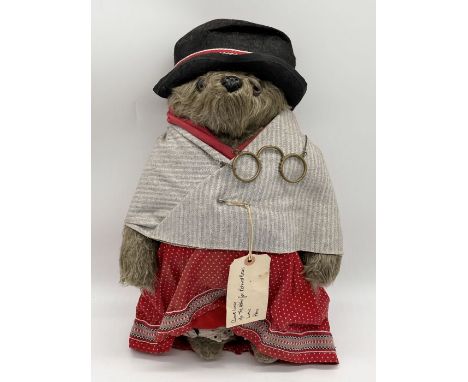 A 1978 Gabrielle Designs Paddington Bear's ' Aunt Lucy ' teddy bear with hat, spectacles, jacket and luggage label for the Pe