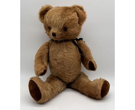 A large vintage Merrythought style teddy bear with a bell in each ear, glass eyes, felt pads, stitched nose and mohair fur - 