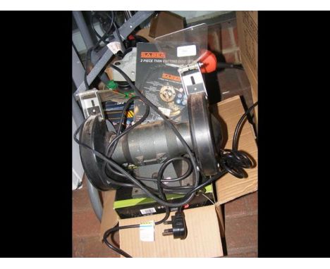 A stock of power tools and machinery including bench grinder and Black &amp; Decker grinder