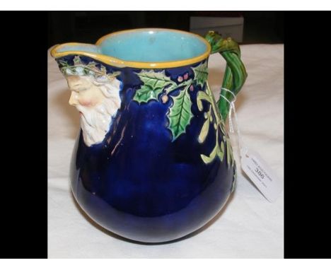 Minton's Christmas jug - 13cms highCONDITION REPORTBy our judgement, condition of lot is good.Notably, the item sports a seam