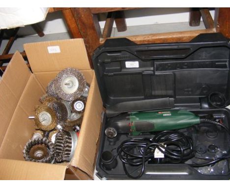 A Parkside multi-tool, together with a box of wire brush attachments 