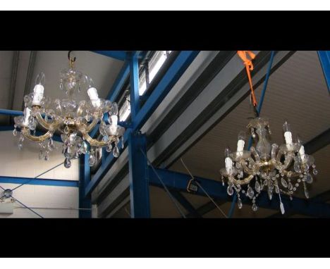 A pair of decorative five branch crystal drop ceiling lightsCONDITION REPORTIn our judgement, condition of lot is fair. Notab