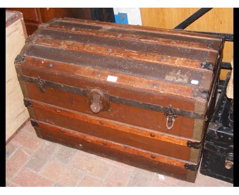 A dome top travelling trunk