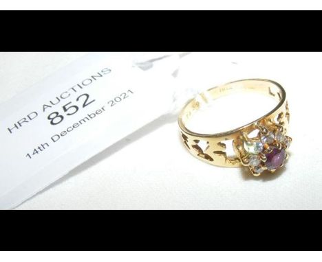 A ruby and diamond ring in 18ct setting