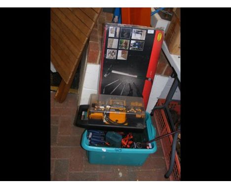 A box of new tools, including power sharpener, multi purpose air tools 
