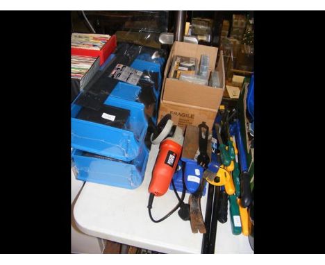 A pair of sealed Powerfix storage boxes together with assorted crow bars, an anvil and a Black &amp; Decker hand held grinder
