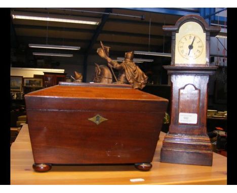 A miniature longcase clock, together with a mahogany tea caddy 