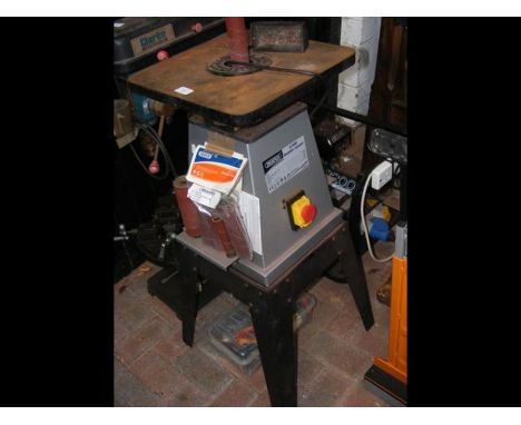 A bobbin sander on stand
