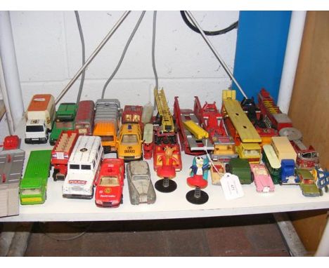 A collection of die cast vehicles, including Corgi and Dinky 