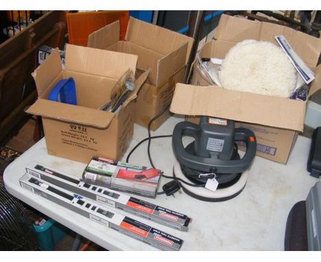 A new electric buffer, together with new tools (contained in two boxes) 
