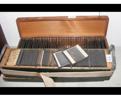 Two wooden boxed containing interesting magic lantern slides of various subjectsCONDITION REPORT.