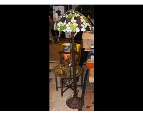 A Tiffany style floor lamp with grape design (See also Lot 615) 