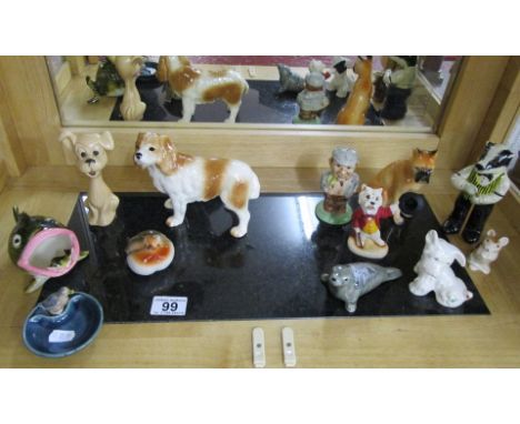 Shelf of animal figures to include Wade, SylvaC & Beswick