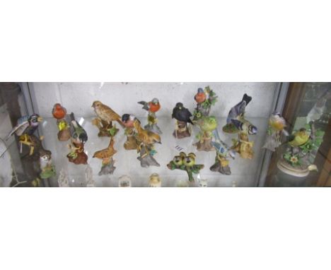 Shelf of bird figures