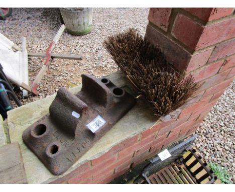 Converted railway bracket boot scraper