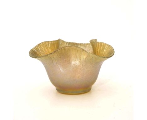 Frederick Carder for Steuben, an Art Nouveau iridescent glass bowl, Aurene, trefoil lobed crimped rim, crackled lustre, incis