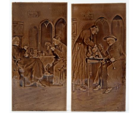 Pilkington, a pair of relief moulded genre tile panels, decorated with interior vestry scenes of priests in conversation, bro