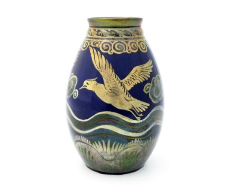 William S Mycock for Pilkington, a Royal Lancastrian lustre vase, 1932, ovoid form, painted with birds in flight over a rolli