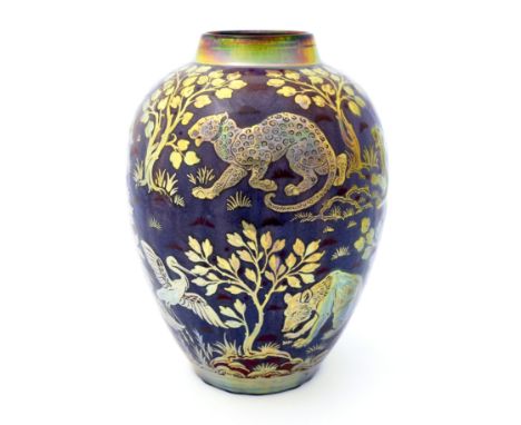 Richard Joyce for Pilkington, a Royal Lancastrian relief moulded lustre vase, 1909, shouldered ovoid form, decorated with var