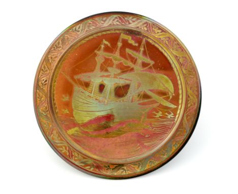 William S Mycock for Pilkington, a Royal Lancastrian lustre galleon charger, 1924, flat circular form, red ground with ship i