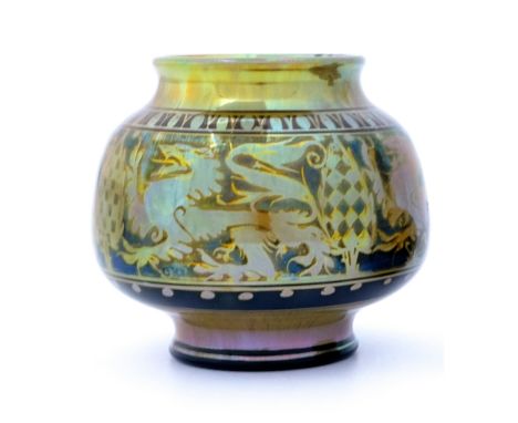 Gordon Forsyth for Pilkington, a Royal Lancastrian lustre vase, 1914, squat ovoid form, painted with lions passant, between c