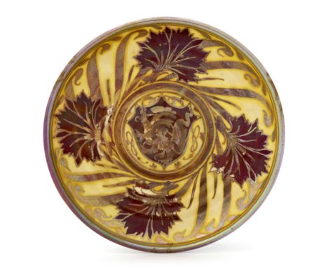 Gordon Forsyth for Pilkington, a Royal Lancastrian heraldic lustre bowl, 1909, shallow ribbed circular form, painted with a c