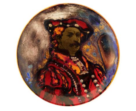 Bernard Moore, a flambe lustre Rembrandt portrait plate, over painted and jewelled with iridescent enamel beads, painted mark