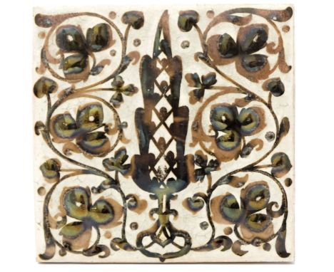 J H Sellers for Pilkington, a Royal Lancastrian relief moulded lustre tile, painted with a cedar tree between foliate scrolls