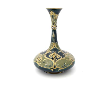 William Moorcroft for James MacIntyre, a Green and Gold Florian vase, circa 1903, knop necked ships decanter form, printed ma