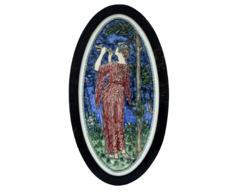 Edmund Kent for Pilkington, a Royal Lancastrian tubelined tile, circa 1910, oval form, decorated with a Classical woman playi