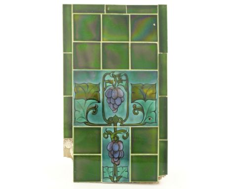 Pilkington, an extensive Royal Lancastrian tile panel, comprised of foliate painted panels within plain green tiles, 98cm x 2