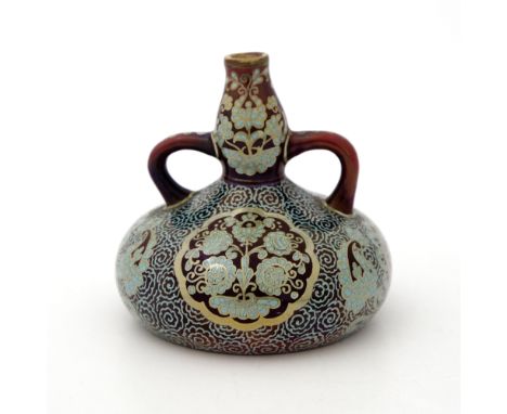 Zsolnay, Pecs, a miniature lustre vase, circa 1915, twin handled double gourd bottle form, painted with floral cartouches and