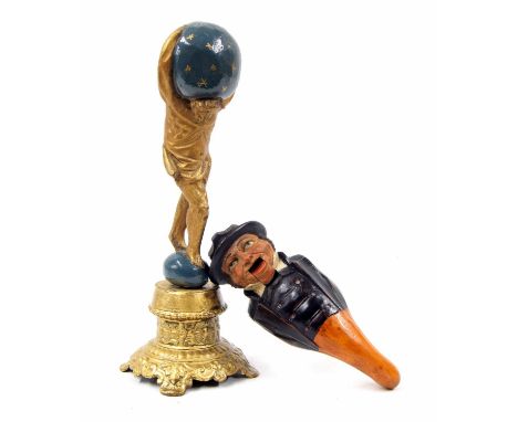 Novelty carved treen figural nutcracker, modelled as a Russian gentleman in typical hat and suit, 8" long; together with a ca