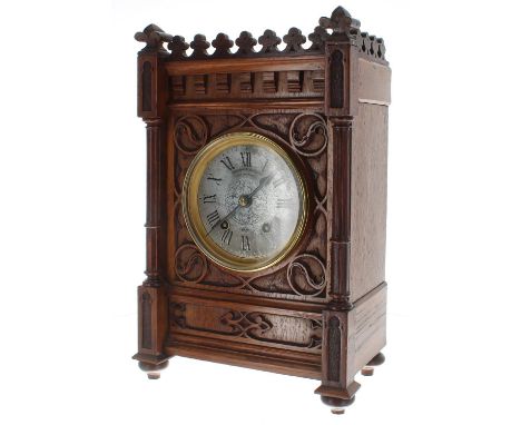 Arts &amp; Crafts oak two train mantel clock, the 4.25" silvered dial with Roman numerals signed Parkinson &amp; Frodsham, Lo