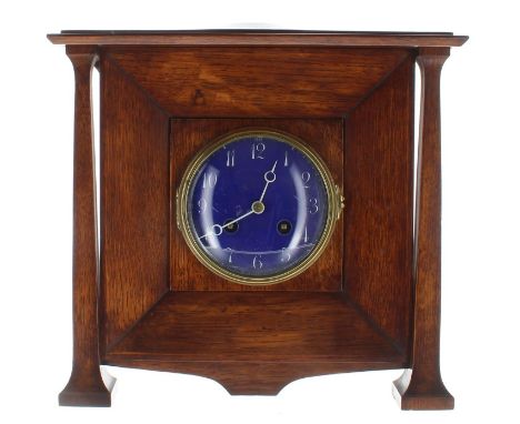 Arts & Crafts oak two train mantel clock in the manner of Liberty, the 4.25" blue enamelled convex dial with white Arabic num