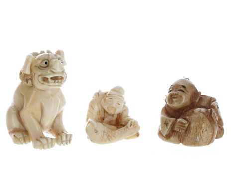 Three antique Japanese ivory netsuke, the buddhistic lion 1.75" high (3) 