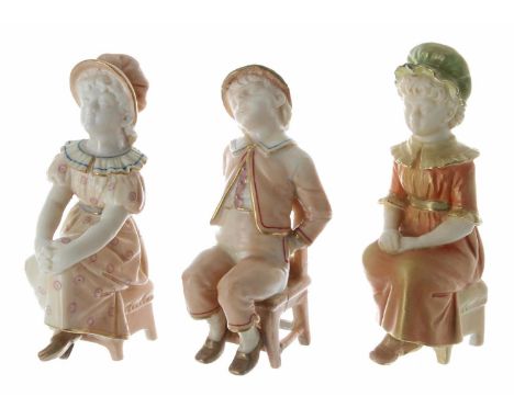 Royal Worcester - three blush ivory porcelain figures of seated children; a boy asleep and two girls, factory stamps to the u