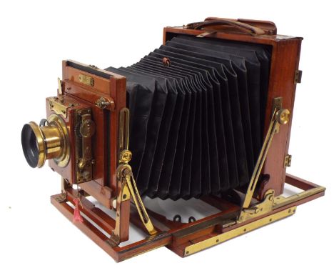 Late 19th/early 20th century 'The Victo' mahogany cased field camera, by Houghtons Ltd. London with triple extending rack and